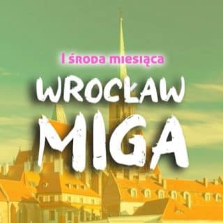 Na tle miasta z wieżami kościelnymi napis Wrocław miga